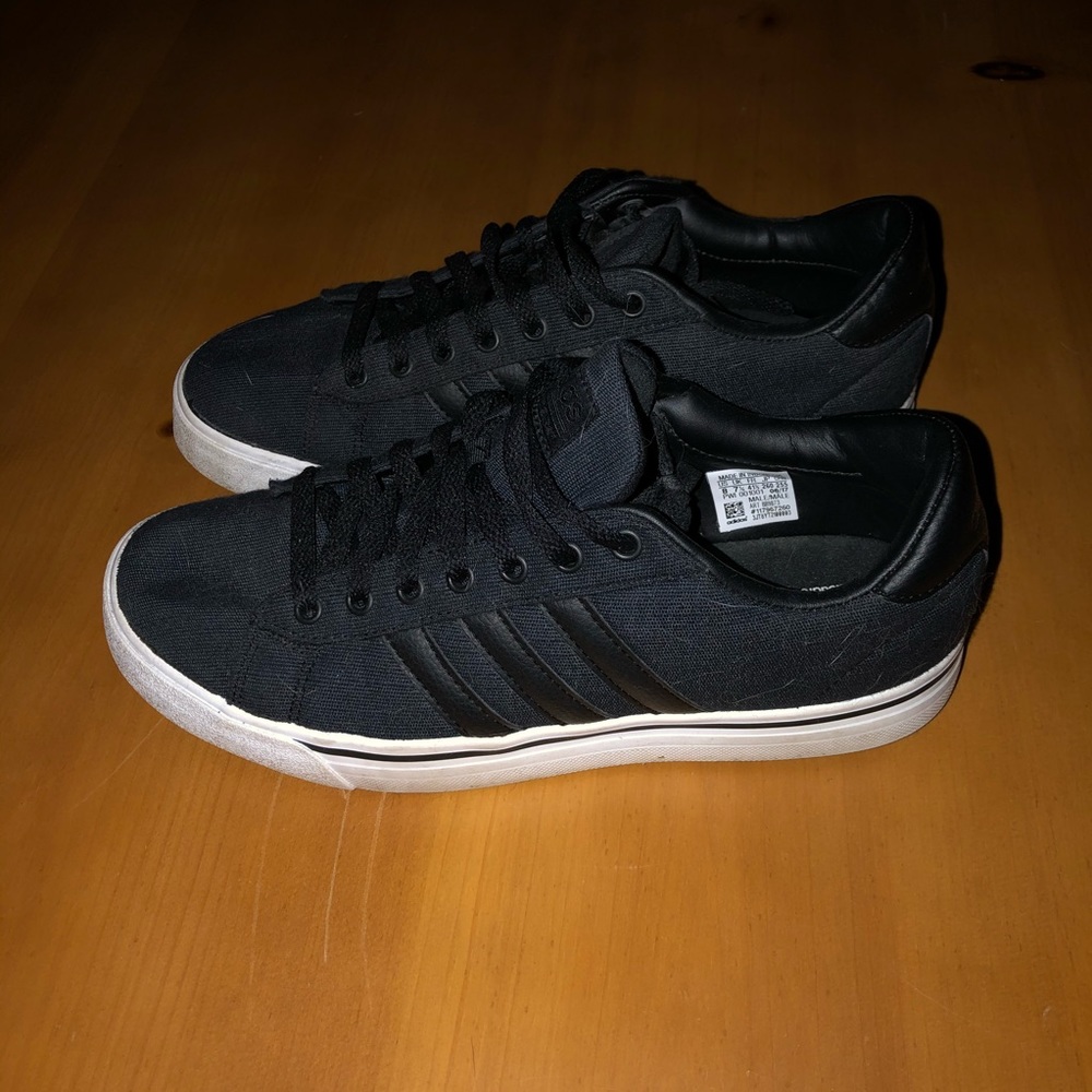 Men’s size 8 Black Adidas shoes worn once.